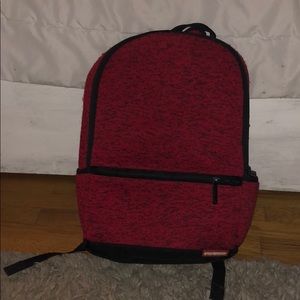 Red spray ground bag
